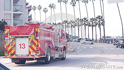 Red firefighters fire truck or engine, emergency lifeguard car, , California USA Editorial Stock Photo