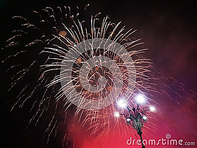 Red fireworks night sky New Year Stock Photo