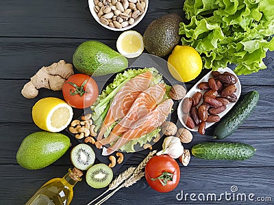 salmon fish, avocado organic green dietary on a wooden healthy food assorted Stock Photo