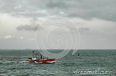 Red fishing boat in paranagua harbour brasil Stock Photo