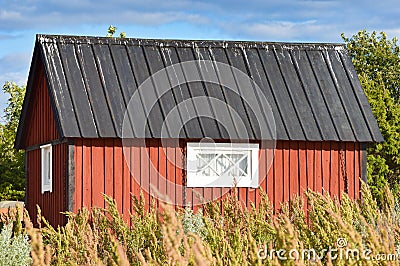 Red fishing hut on Sweden island, Oland Stock Photo