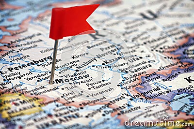 Red flag pushpin pointing Moscow Stock Photo