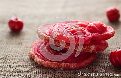 Red flavored puffed fried on brown sack background Stock Photo