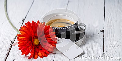 Red flower, cup and card Stock Photo