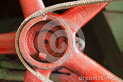 Red flywheel with belt Stock Photo