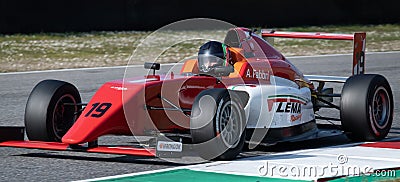 Red formula racing car close up action on motor sport racetrack Editorial Stock Photo