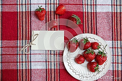 Red Fresh Strawberries on the Ceramic Plate,on the Check Tablecloth.Wish Card.Breakfast Organic Healthy Tasty Food.Cooking Vitami Stock Photo