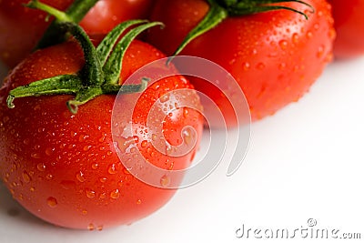 Red fresh tomatoes on white background Stock Photo