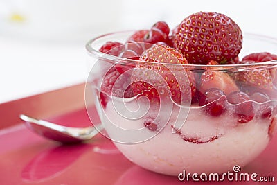 Red fruits in bowl glass Stock Photo