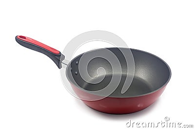 Red frying pan with a nonstick coating Stock Photo