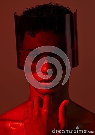 Red future night, black man portrait and futuristic punk glasses on face against dark background in studio. Cyber model Stock Photo