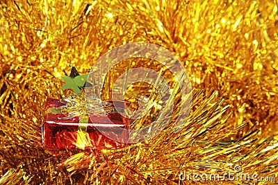 Red gift box golden fluffy decorations Stock Photo
