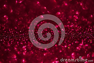 Red glitter magic background. Defocused light and free focused place for your design. Stock Photo