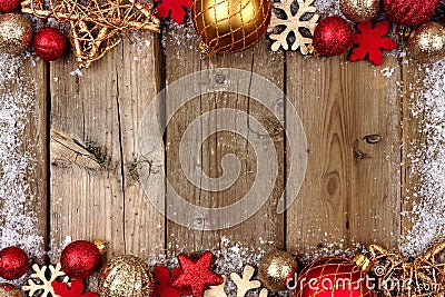 Red and gold Christmas double border with snow on wood Stock Photo