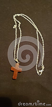 Red goldstone cross necklace Stock Photo