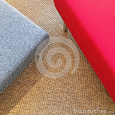 Red and gray seats on carpet floor Stock Photo