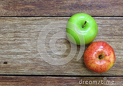 Red and green apple fruit on wood Stock Photo