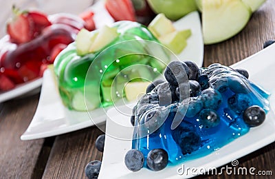 Red, green and blue Jello with fruits Stock Photo