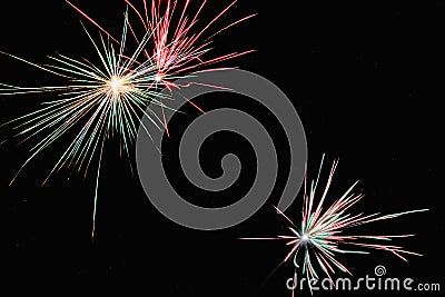 Red and green fireworks on New Year`s Eve Stock Photo