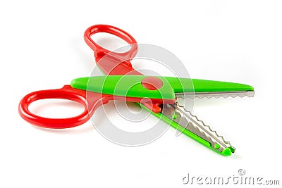 Red and green plastic scissors Stock Photo