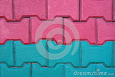 Red and green sidewalk block tiles close up shot at a residentual house, image for background Stock Photo