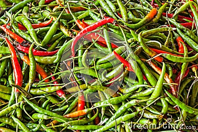 Red and green spicy chili peppers Stock Photo