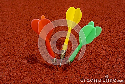 Red, green and yellow colored dart arrows Stock Photo