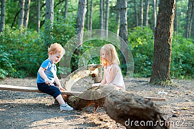 Red-haired brother and sister playing Stock Photo