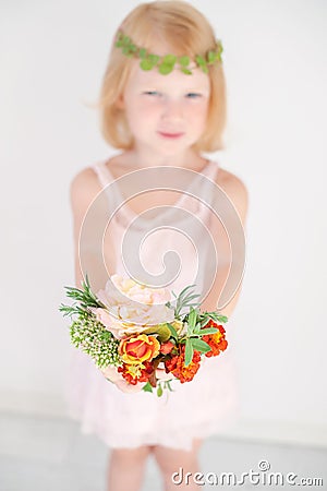 Red-haired girl in a pink dress Stock Photo