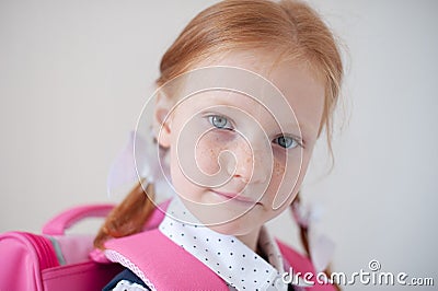 Red-haired schoolgirl indoors Stock Photo
