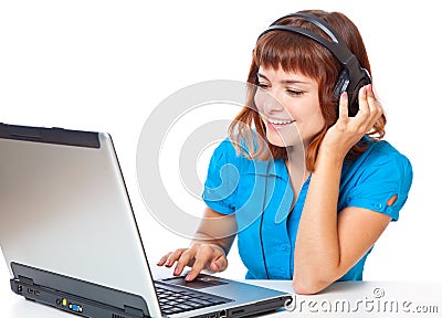 Red-haired teen-girl listen to music Stock Photo