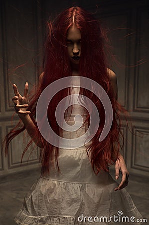 Red haired zombie woman Stock Photo