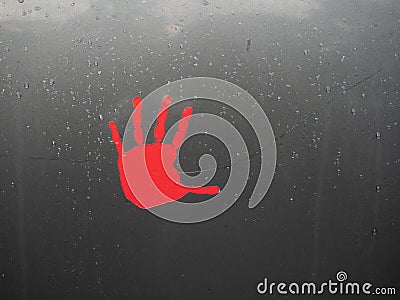 Red Handprint Decal for Missing and Murdered Indigenous Women and Girls Stock Photo