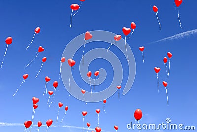 Red heart balloons in the sky Stock Photo