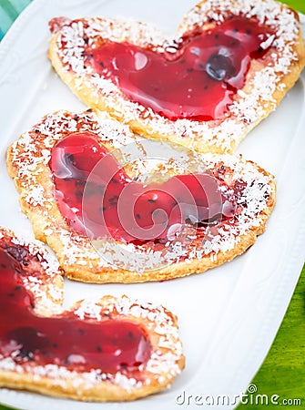 Red Heart biscuits with jam Stock Photo