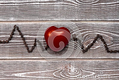 Red heart, cardiogram of coffee beans. Stock Photo