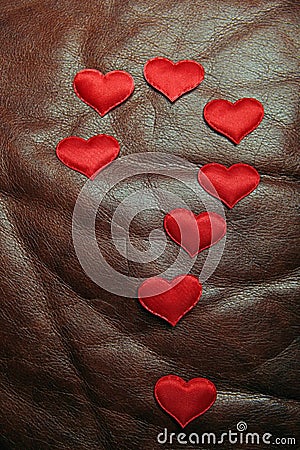 Red heart dark leather background Stock Photo