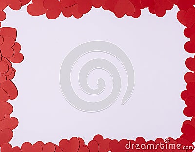 Red heart frame with heart shaped paper confetti with blank white background. Perfect for Valentines day creative compositions in Stock Photo