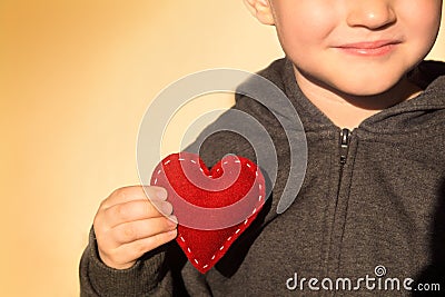 Red heart in hand Stock Photo