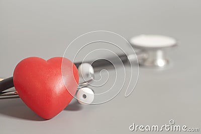 Red heart with a medical stethoscope Stock Photo