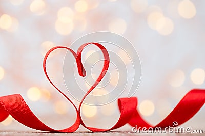 Red heart with ribbon. Valentines day background. Stock Photo