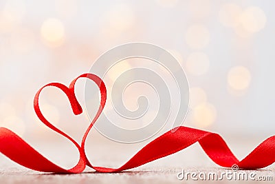 Red heart of ribbon. Valentines day background. Stock Photo
