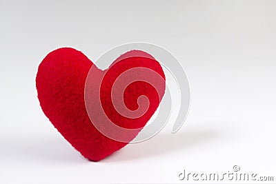 Red heart shaped fabric on white background Stock Photo