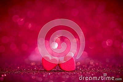 Red Heart shapes on abstract light glitter background in love co Stock Photo