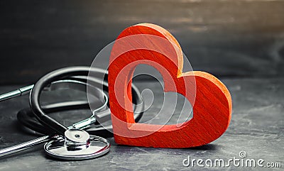 Red heart and stethoscope. The concept of medicine and health insurance, family, life. Ambulance. Cardiology Healthcare. Stock Photo