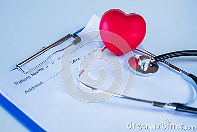 Red heart stethoscope and doctor`s prescription, health examination concept, health insurance, health, self-care, as the doctor Stock Photo
