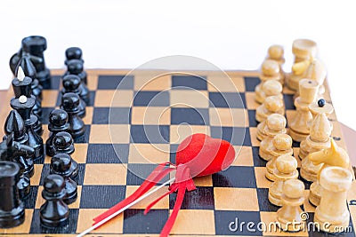 Red heart between two components of chess Stock Photo