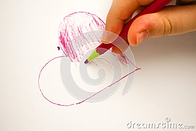 Child drawing heart on white background baby fingers Stock Photo