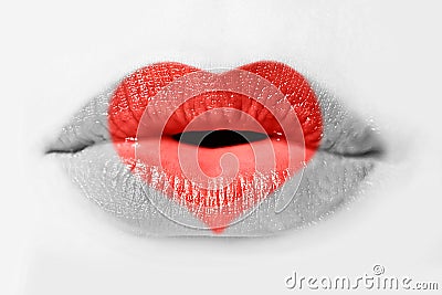 Red heart on woman lips isolated on white Stock Photo