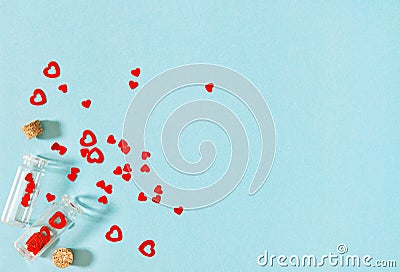 Red hearts decoration blue background Valentines day flat lay Stock Photo